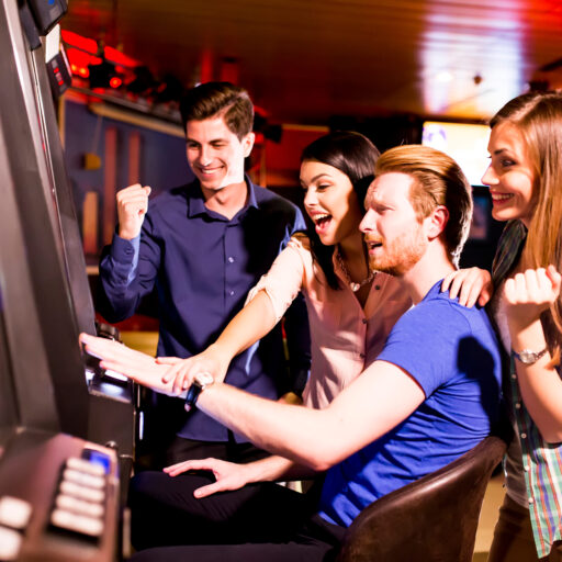 Young people play jackpot in the casino